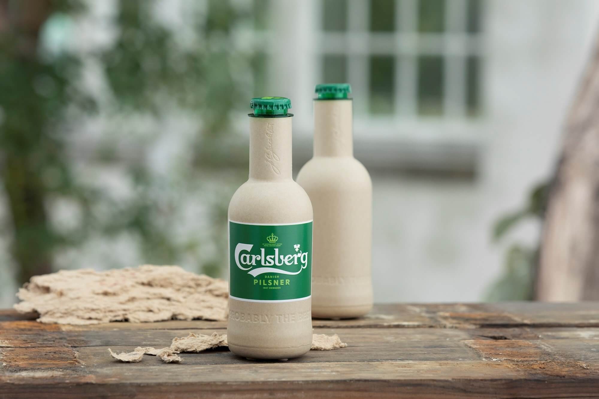Бумажные бутылки Carlsberg